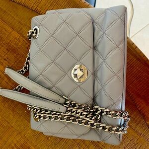 Kate Spade gray quilted crossover purse. Very cute. Looks new.